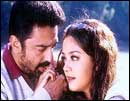 Kamal Haasan and Jyotika in Thenali