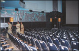 Policemen 'sterilising' a Bombay cinema hall 