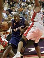 Michael Jordan goes past Shareef Abdur-Rahim