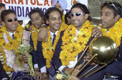 Team members pose with the Trophy