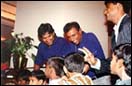 Sri Lankan team members with Bombay's street
kids